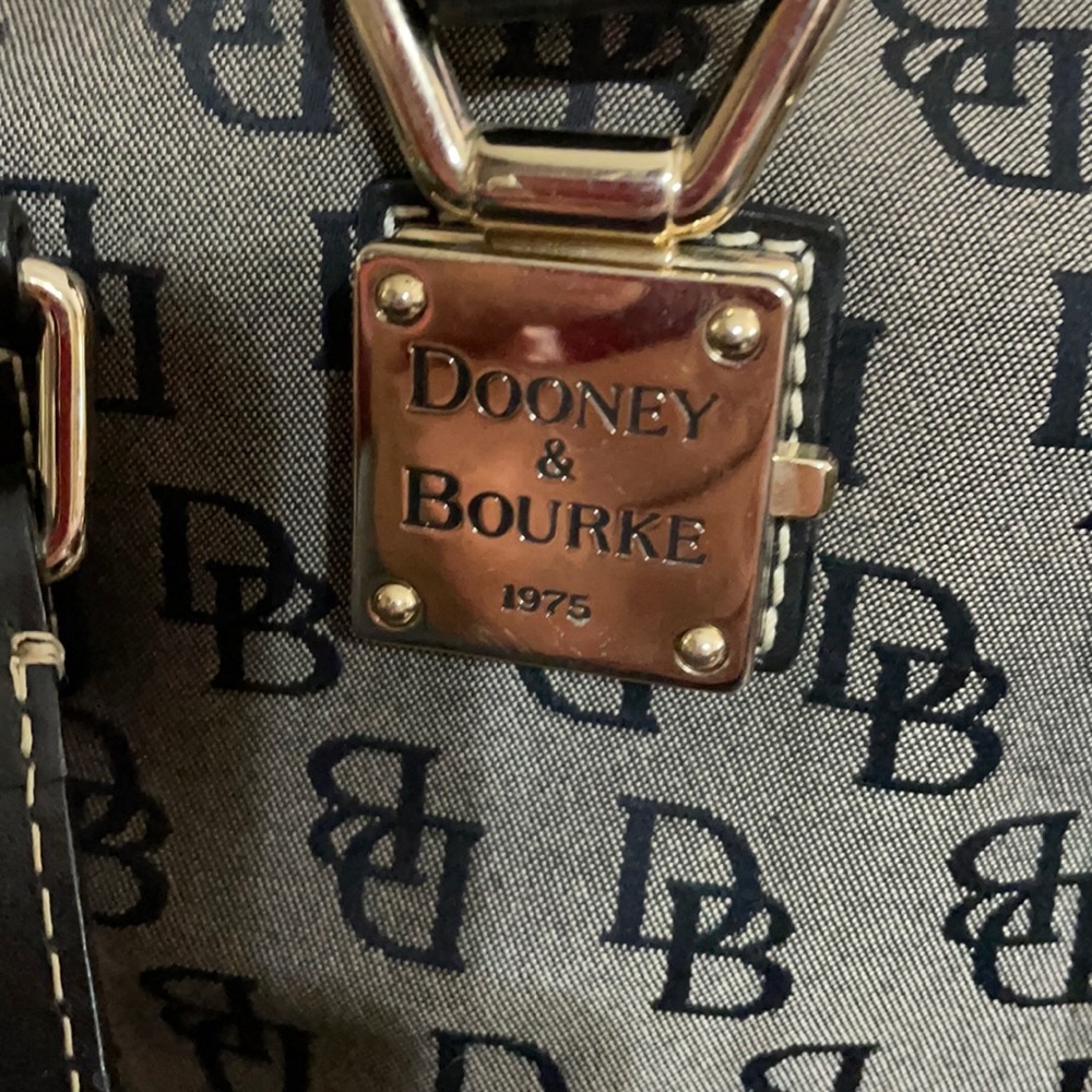 Dooney & Bourke purse. Approx 9” tall and 11” across.